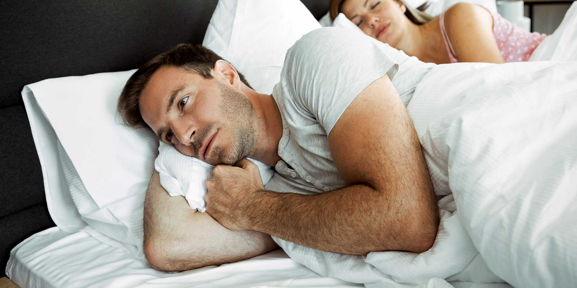man laying in bed