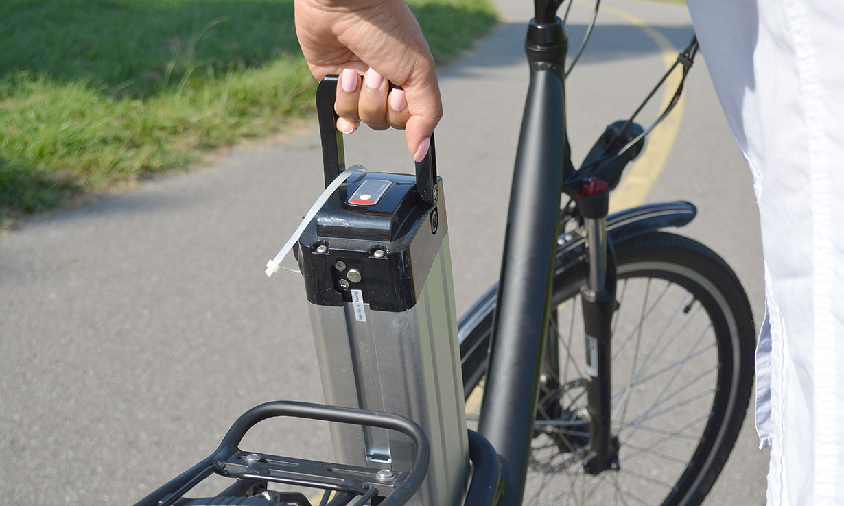 battery being removed from electric bike