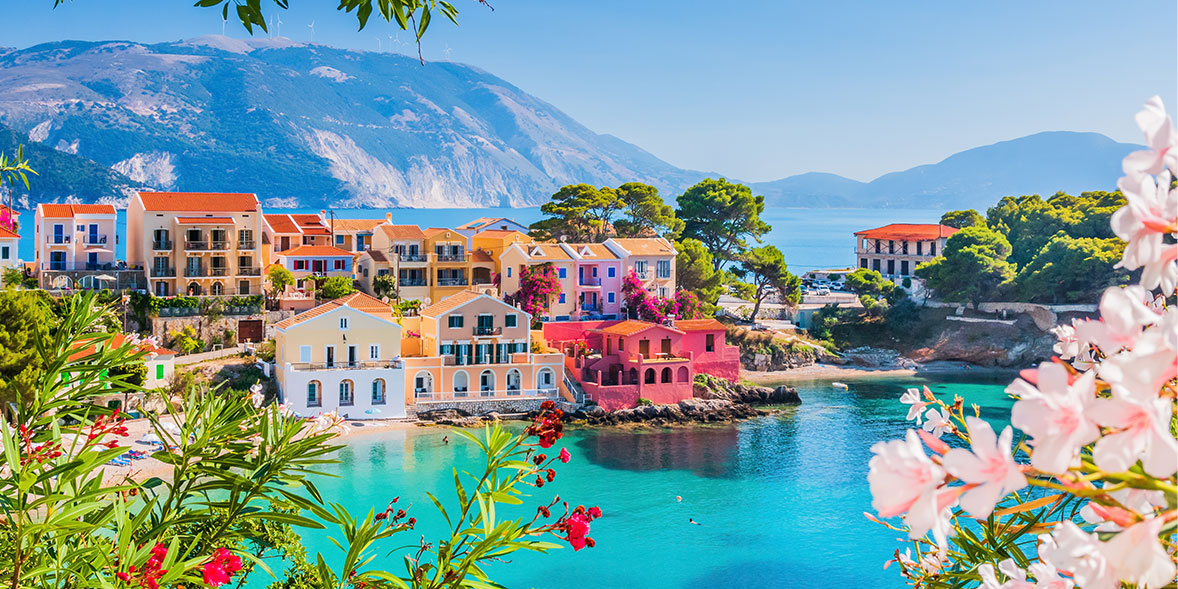 Pastel houses by the sea in Kefalonia, Greece