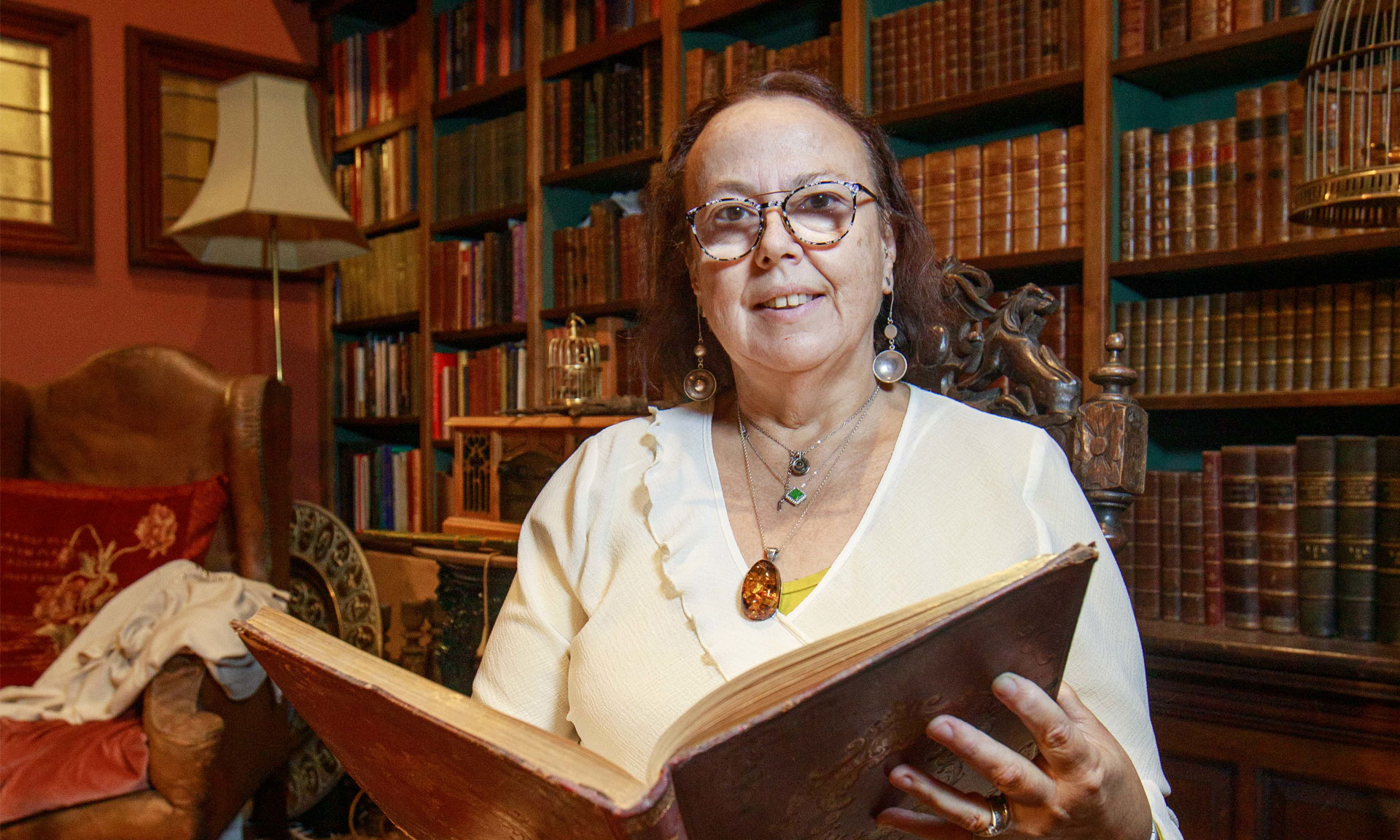 Fiona Wiggins with her book collection