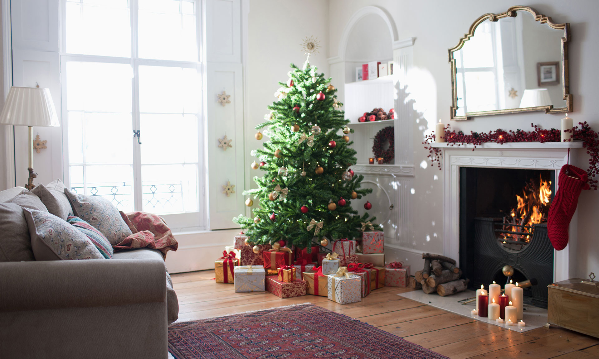 Christmas tree in a room with presents underneath