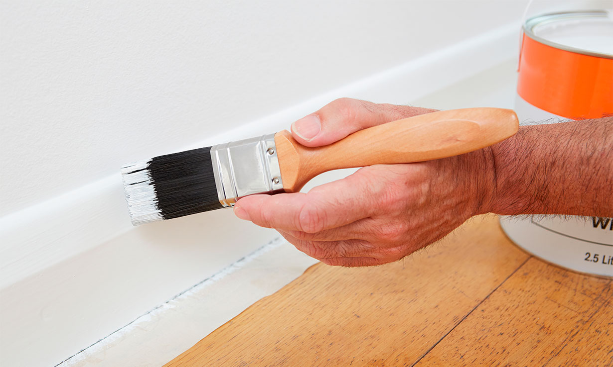 Painting a skirting board