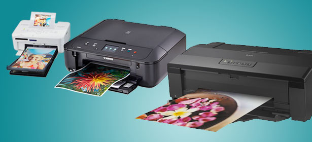 A small photo printer, an A4 printer, and an A3 printer side by side