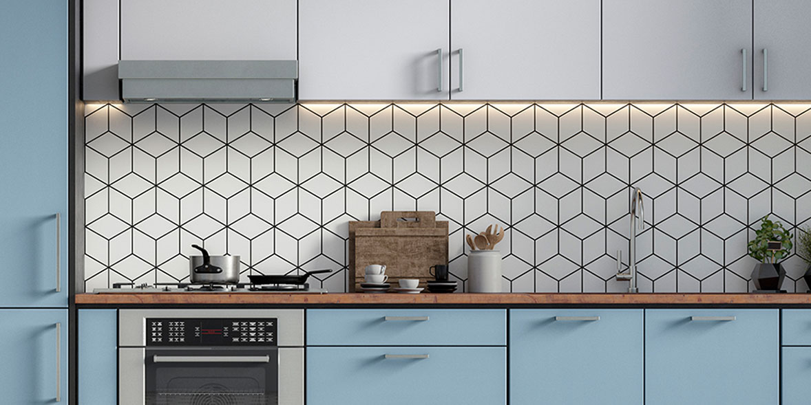 Blue kitchen cabinets with white-tiled splashback